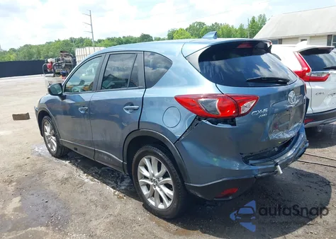 2015 Mazda Cx-5 Grand Touring z USA, uszkodzony, nr VIN JM3KE4DY5F0471689